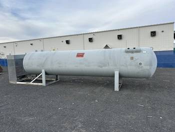 1986,  1845 Gallon propane tank and stand with metered pump system 