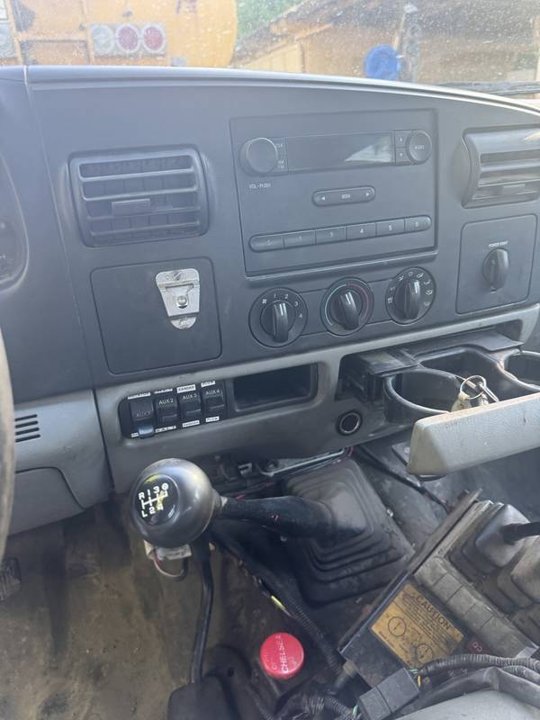 2006 Ford F550 Crewcab, 4x4, Steller Hook retrieval system w/ front Boss V-Plow