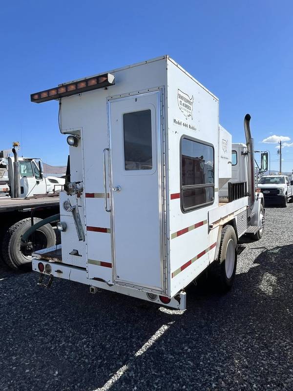 2003 Freightliner FL-80 (CN-84)